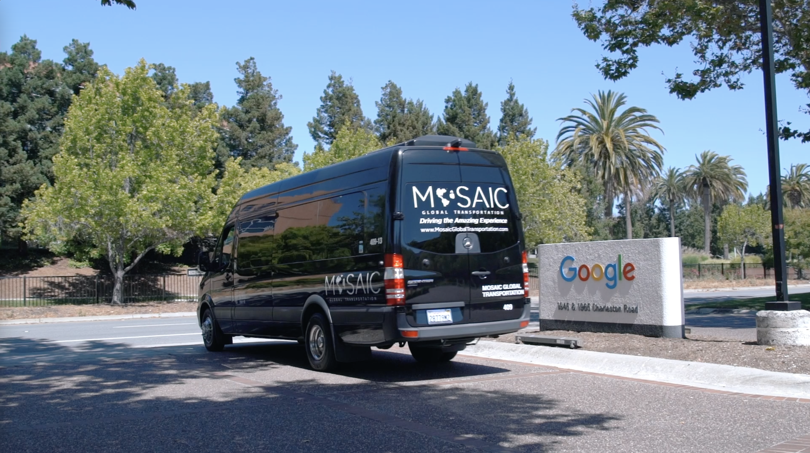 Mosaic Global Transportation van in front of a Google business sign